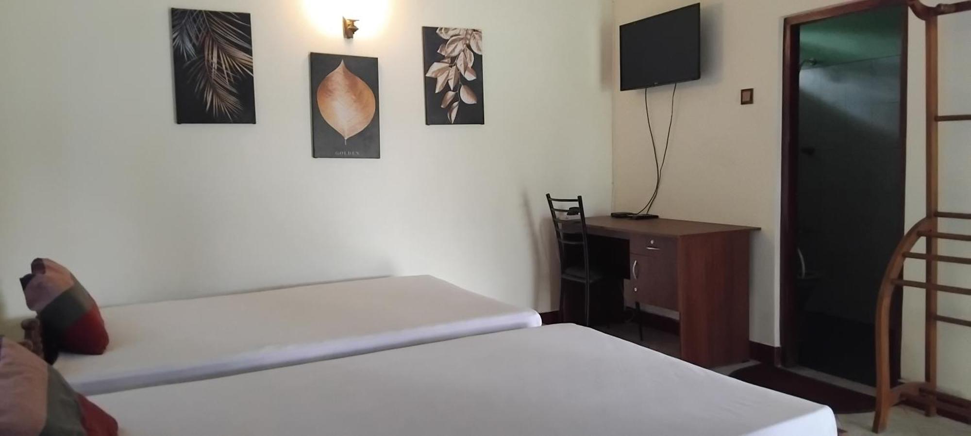 Hansika Guest Inn Buttala Pokoj fotografie